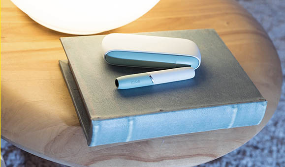 Man Holding IQOS 3 White