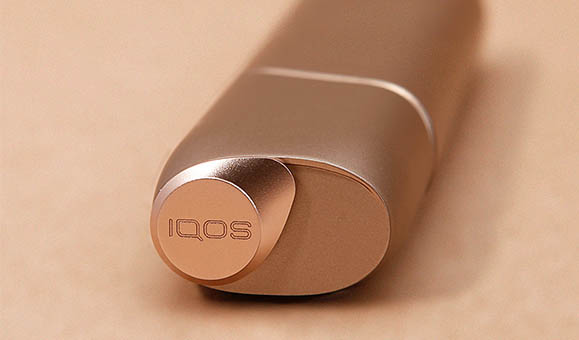 Man Holding IQOS 3 White