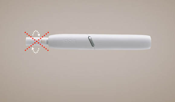 Man Holding IQOS 3 White