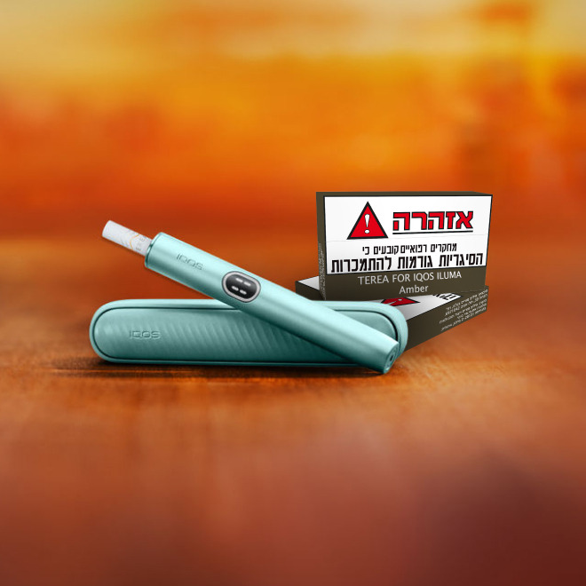 An IQOS ILUMA PRIME Holder with a TEREA stick inserted next to an IQOS ILUMA Pocket Charger.