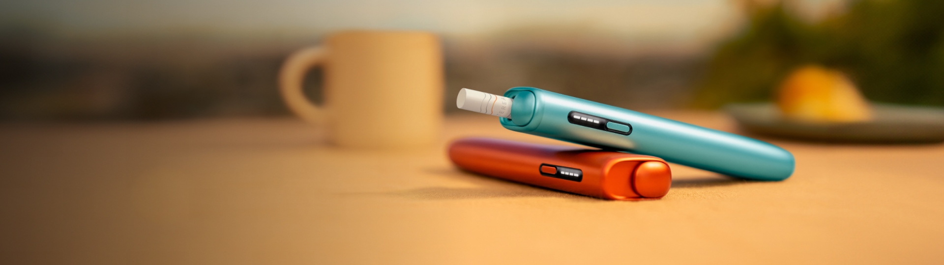 An IQOS ILUMA i ONE device.