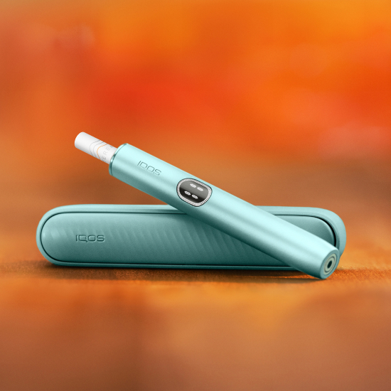 A Jade Green IQOS ILUMA PRIME Pocket Charger. 