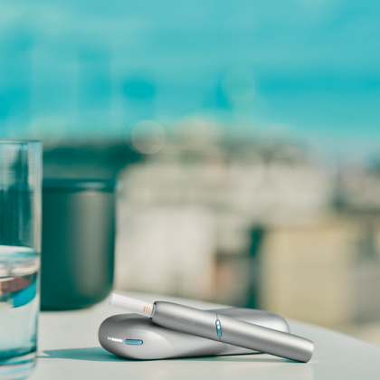 A gold IQOS device.