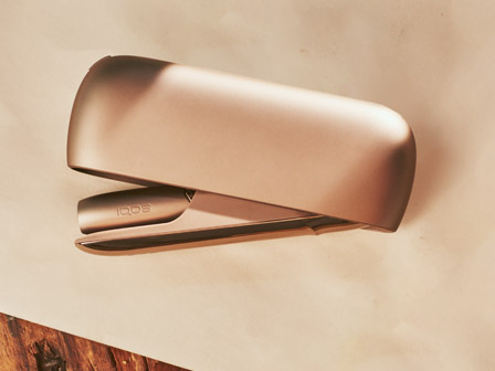 Woman checking her IQOS coach tips