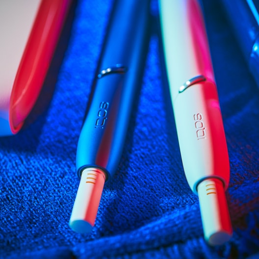 A gold IQOS device.